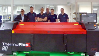 Geschäftsführung und Mitarbeiter von Reproflex sowie der Verkauf von Flint sind überzeugt von der neue Investition in den ThermoFlexX TFxX 80-D (Quelle: Flint Group)