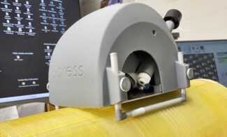 Sibress demonstriert auf der Labelexpo eine neue Version des FlexoControl 3D Plus für das Messen von Fotopolymer-Sleeves (Quelle: PR KOM)